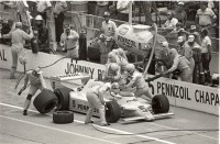 Johnny Rutherford visits the pits in the 1982 Indianapolis 500